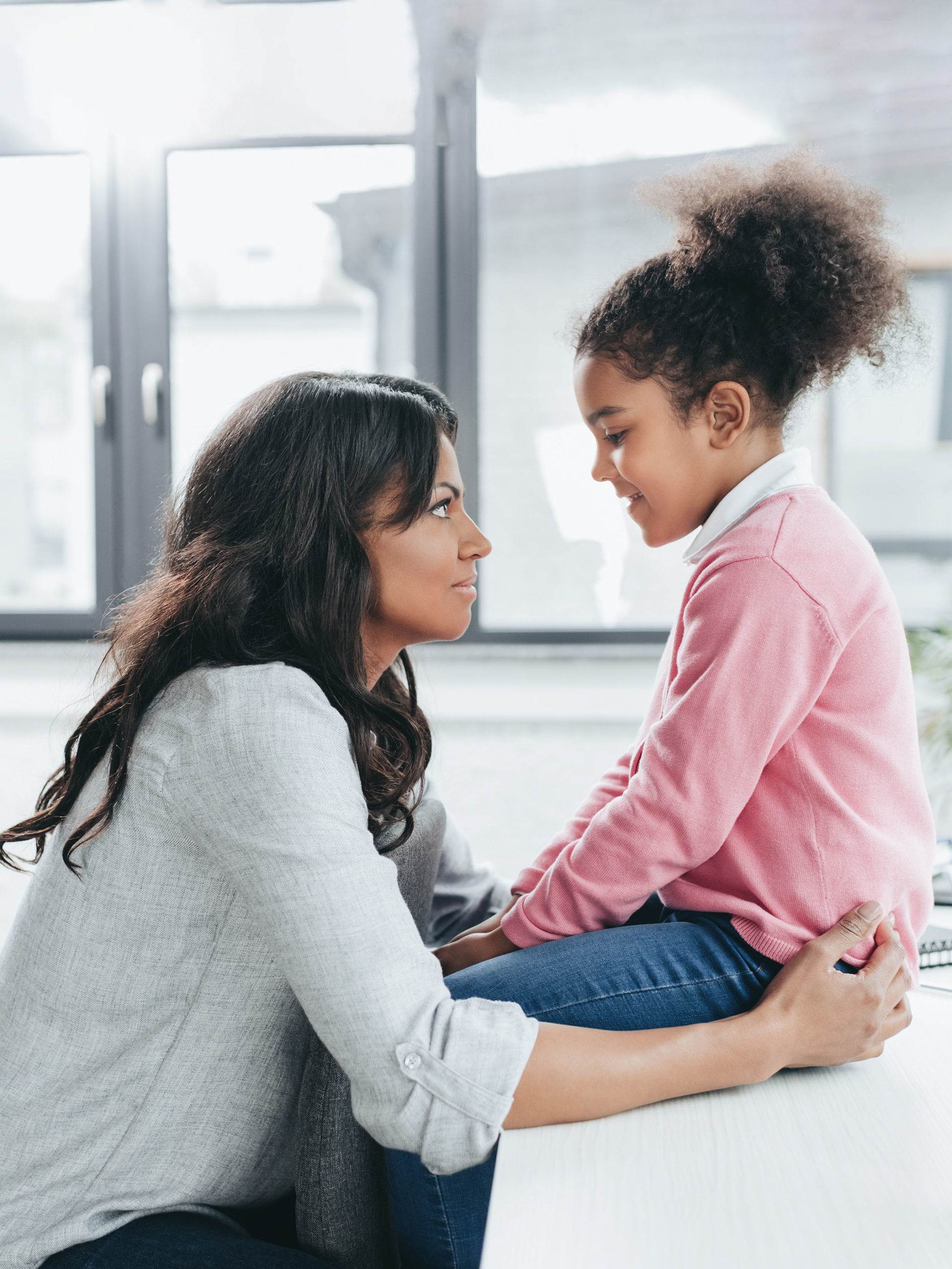 mom and daughter, connecting and having a serious talk